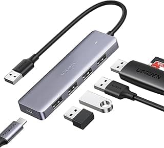 موزع UGREEN USB 3.0 بـ 4 منافذ فائق النحافة للابتوب، موزع متعدد المنافذ مع منفذ شحن 5 فولت متوافق مع Surface Pro وPS5/PS4/Xbox One، فلاشة، هارد ديسك، كيبورد، ماوس