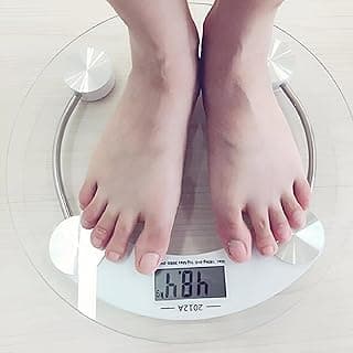 Body Weighing Scale - High-precision glass body scale with a robust 8mm tempered glass, ensuring an elegant and trustworthy weighing experience up to 180kg.